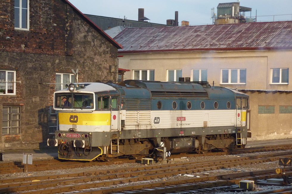 754 048-7