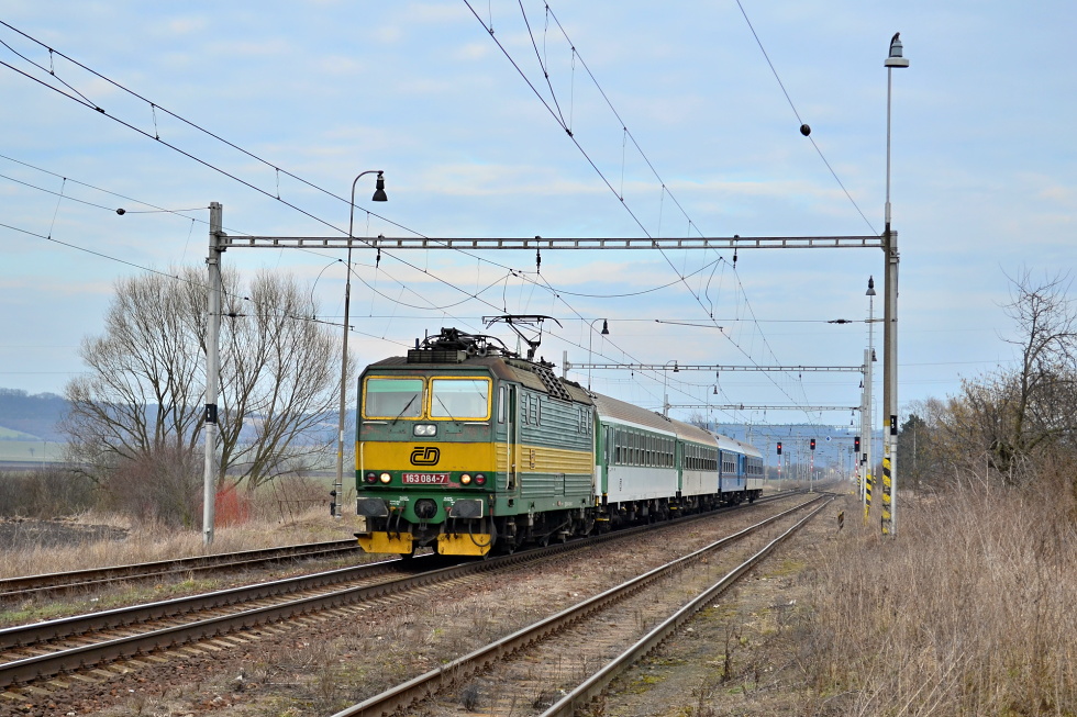 163 084-7