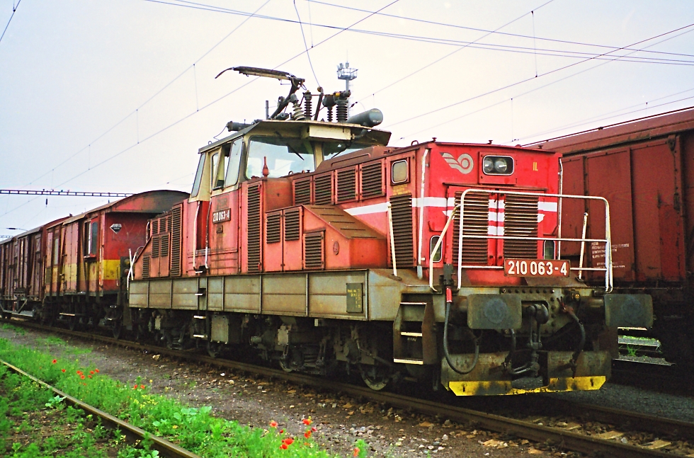 210 063-4