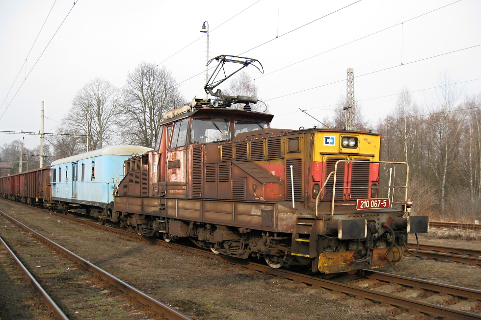 210 067-5