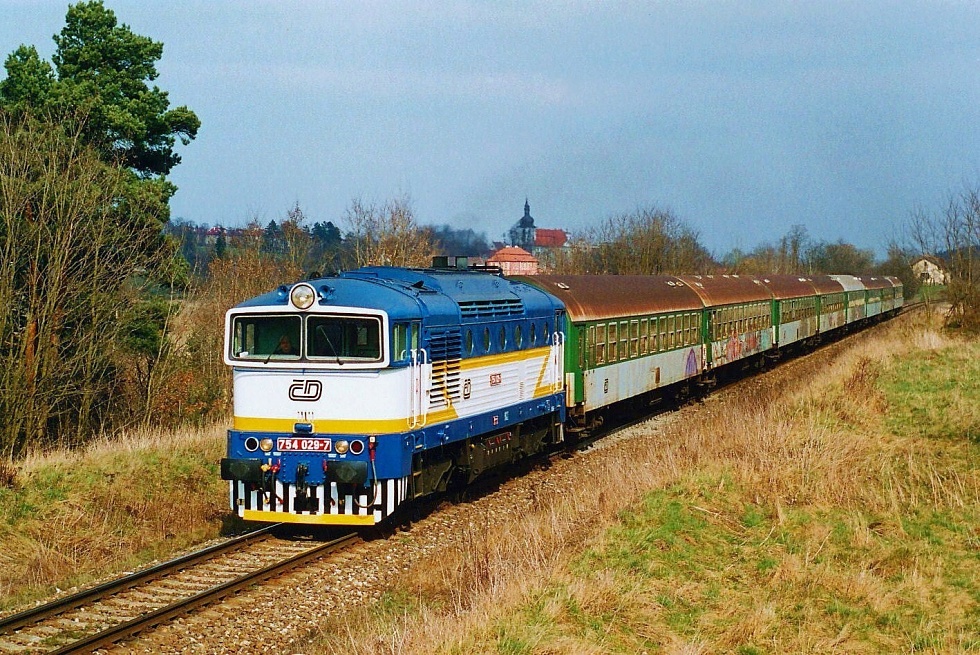 754 029-7