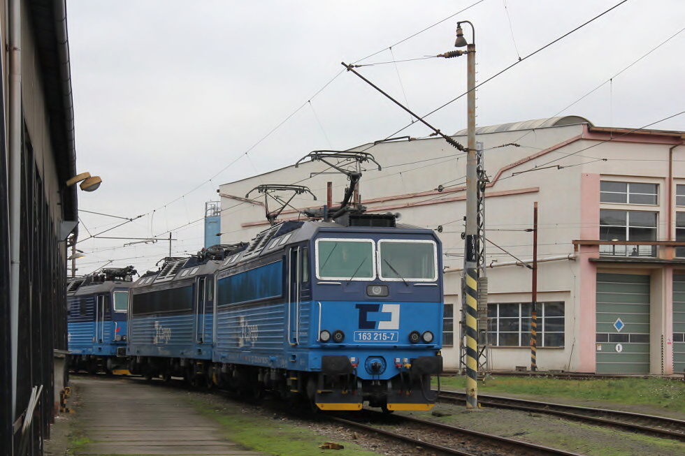 163 215-7